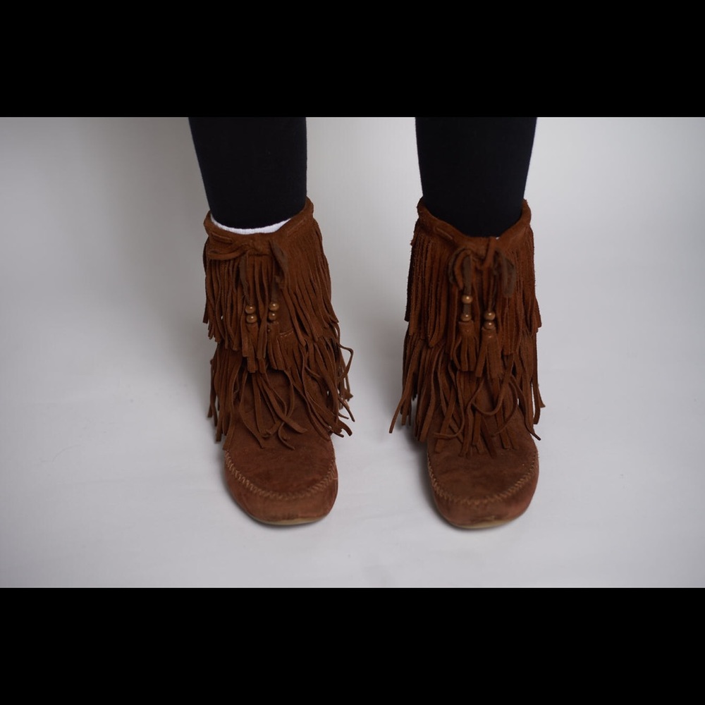 Brown suede fringe moccasin boots